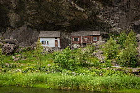 两座古老的定居点位于岩石下HelrnJosigfjord斯塔万格南北图片