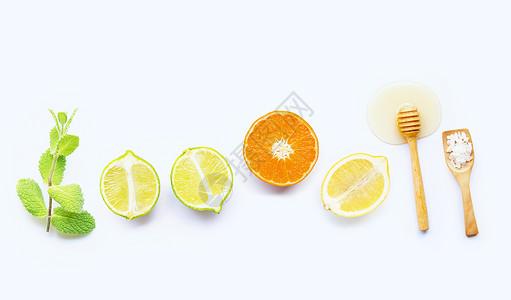 薄荷盐和蜂蜜及柑橘色热带水果图片