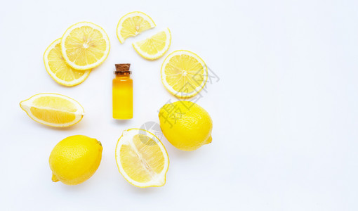白底柠檬的必备油背景图片