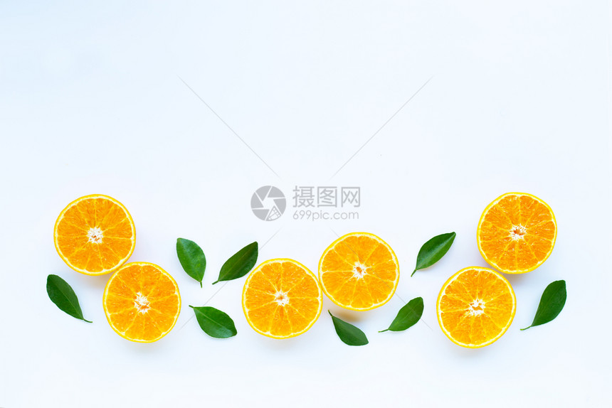 高维生素C橙色水果白背景叶子图片