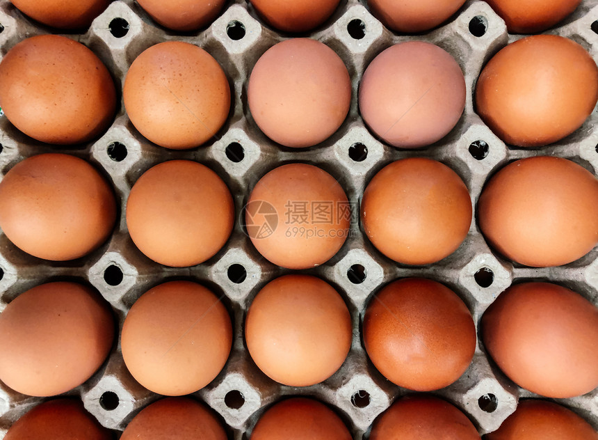 纸箱中的棕色鸡蛋关闭顶端视图镜头有机农场新鲜产品图片