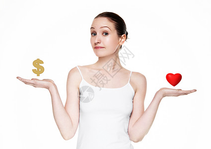 在白背景的爱情和金钱之间做出选择图片
