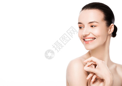 美丽的女可爱笑脸天然化妆水白色背景的皮肤护画像图片