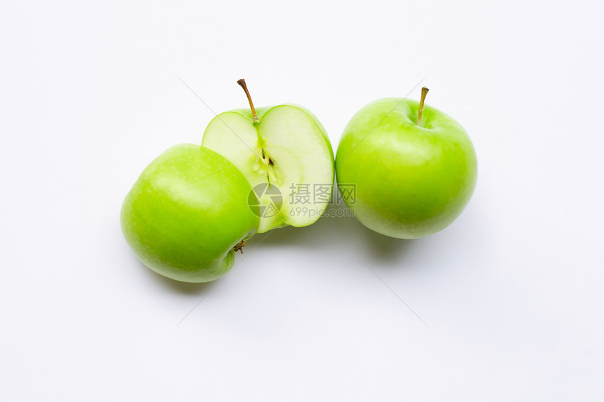 白色背景上的绿苹果图片