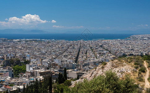 埃斯比约从菲洛帕布山顶上取出的雅典城至比劳埃斯港从菲洛帕布山顶取出的雅典城全景背景