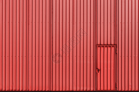 珊瑚色金属板墙和门的仓库外铝板工业和门大楼的金属门图片