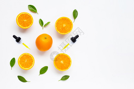 白底带新鲜橙果的柑橘油色天然维生素c图片