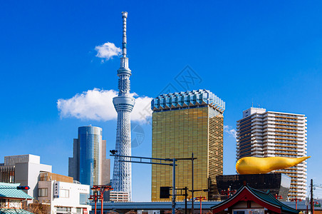 2018年月9日本东京东京星际天塔高升至蓝色天空顶冬季有来自亚萨西的啤酒厅来自亚萨库地区日本著名的现代地标和城市风景背景