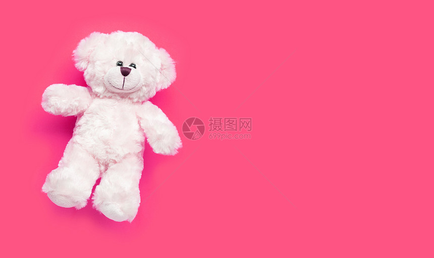 粉红背景的白熊玩具复制空间图片