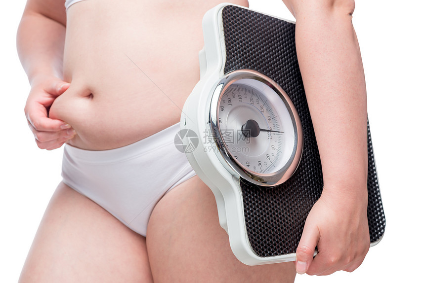 女身体是脂肪在秤的手中概念是该减肥的时候了图片