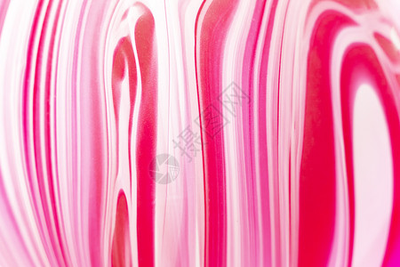 气球表面粉色和白曲线的抽象背景图片