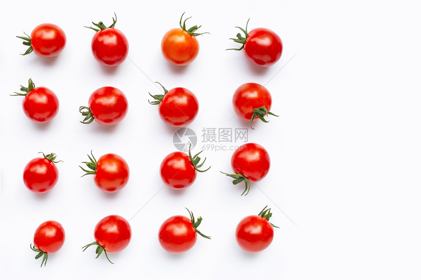 白色背景上的新鲜小西红柿图片