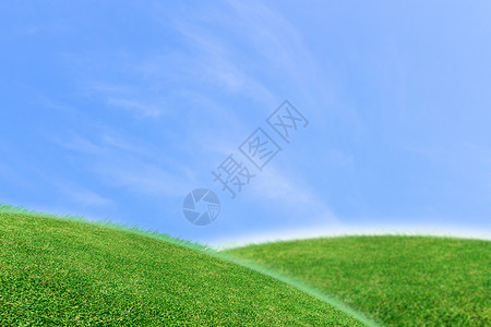 绿草地和天空背景背景图片