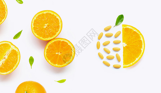 白底绝缘的新鲜柑橘水果维生素c药丸图片