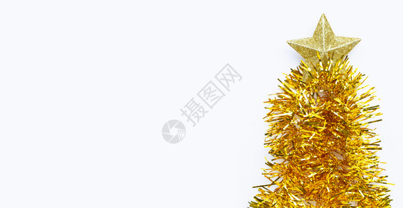 圣诞树由金色的花园制成白底的星复制空间图片