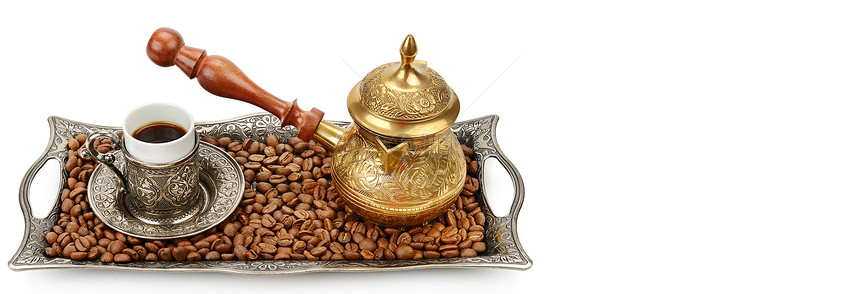 咖啡杯装有阿拉伯饰品的盘子和咖啡壶在白色背景中隔离空闲间供文字使用宽度照片图片