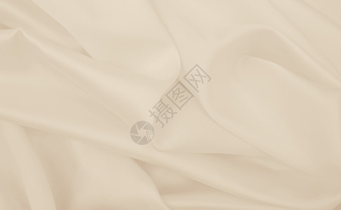 优雅的金丝绸或席恩奢侈布质可用作婚礼背景豪华设计以sepiatold表示背景图片