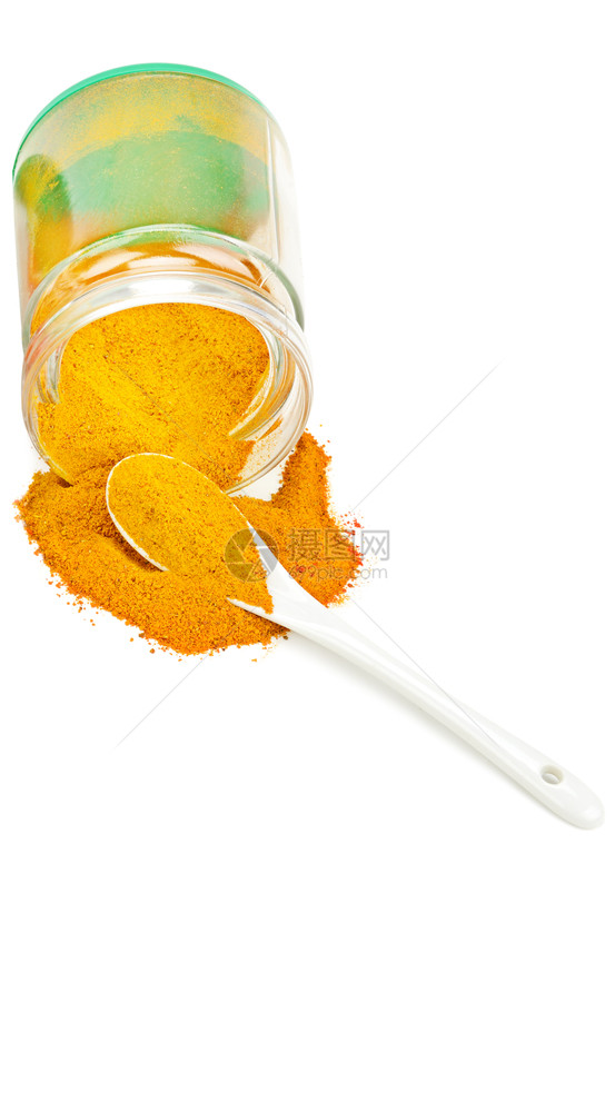 玻璃罐中的黄辣椒粉隔着白色空闲的文字间图片