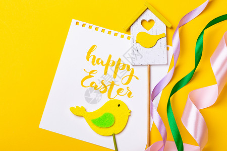 黄色背景的快乐复活节卡图片