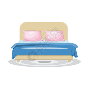用粉色枕头和蓝毯子的床图片