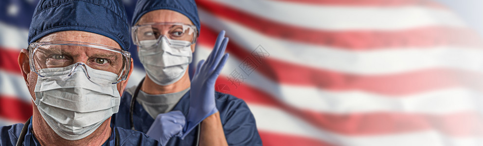 美国护士佩戴医疗个人防护设备的医生或士pe背景