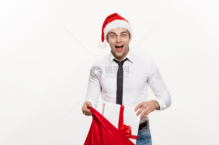 带上圣诞帽的商人图片