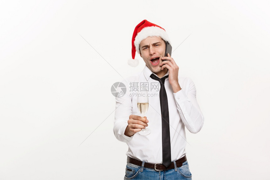 英俊的商人庆祝圣诞节图片