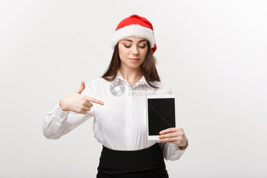 戴圣诞帽的职场女性图片