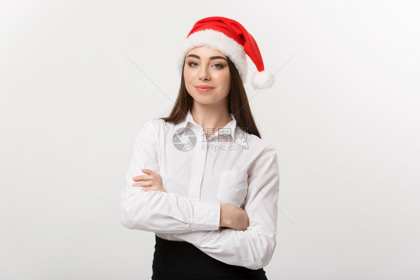 头戴圣诞帽的女商人图片