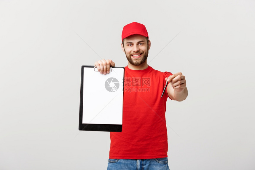 交付概念肖像显示要签署的确认文件表格孤立在灰色工作室背景上复制空间孤立在灰色工作室背景上复制空间肖像显示要签署的确认文件表格图片