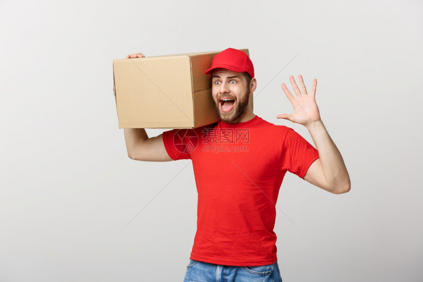 送货员手持纸板盒送货员手持惊喜势图片