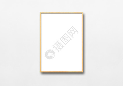 挂在白墙上的木相框空白模型板挂在白墙上的木相框高清图片