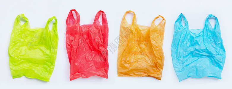 塑料手柄白色背景的彩塑料袋背景