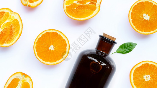 橙色底色白底色的天然橙基本油顶视图背景