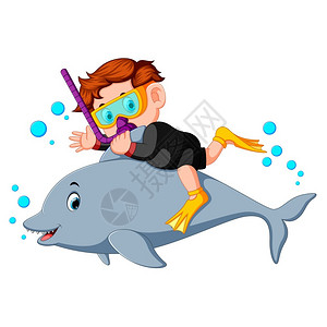 男孩与海豚一起潜水图片