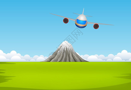 一架商业飞机飞越山区图片