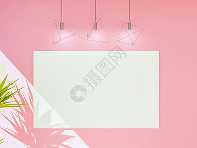 在粉红色墙壁上用灯模拟的空画布海报框架3D显示图片