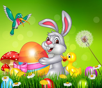 绿草上的兔子拿着复活节鸡蛋矢量插画图片