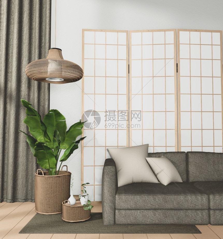 内有沙发和木制地板上植物装饰的热带室内房间图片