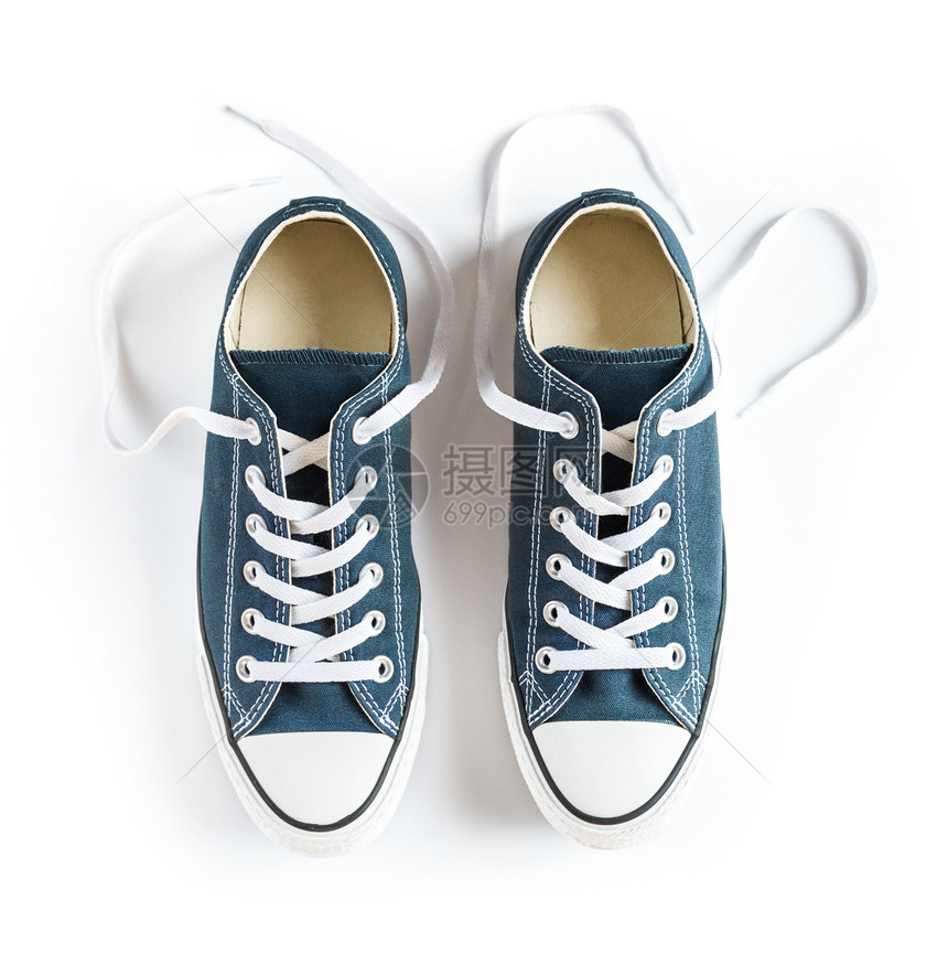 白色背景上隔离的蓝色通用运动鞋白色背景上隔离的蓝色运动鞋图片