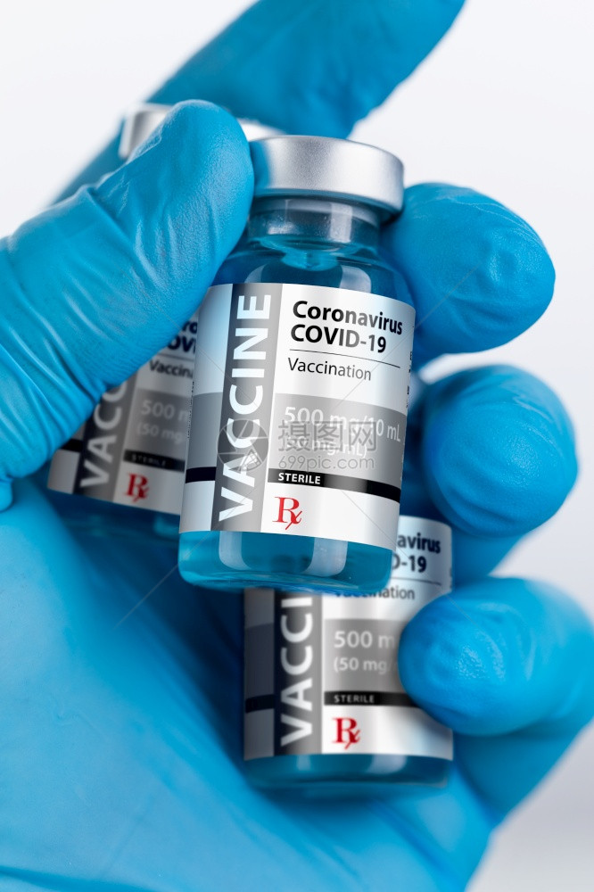 医生或护士佩戴外科手套持罗纳cornaviuscovid19疫苗瓶图片