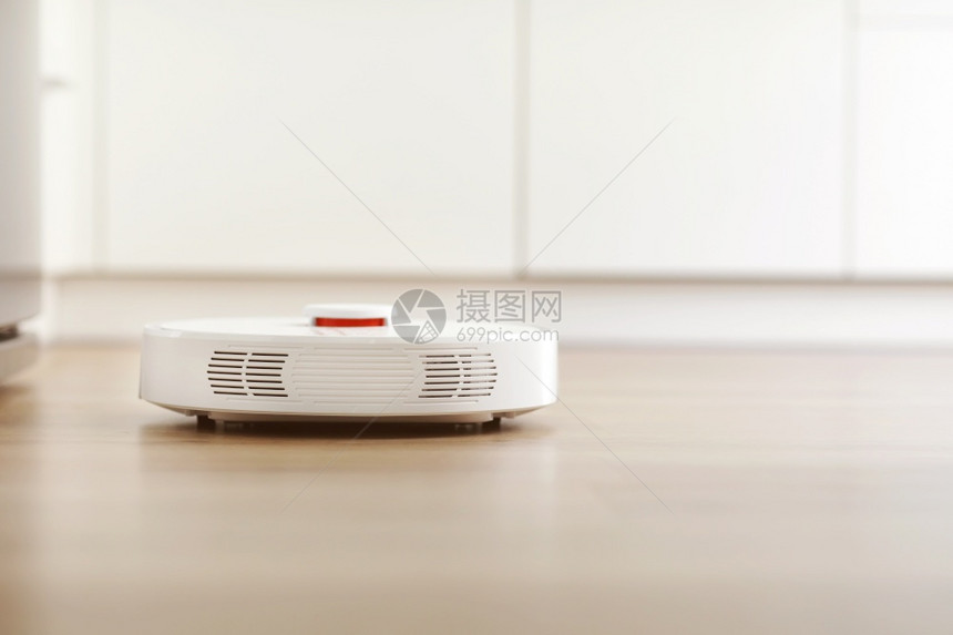 在室内客厅用层地板清洗粉尘的白色机器人吸尘智能电子家用技术智能在室内层地板清洗粉尘的白色机器人吸尘智能家用技术图片