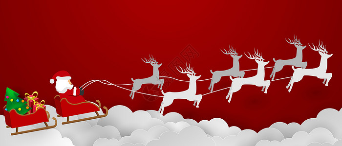 圣诞节坐在雪橇上的圣诞老人与麋鹿图片