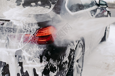 泡沫机清洁汽车服务高压水喷式机细节在洗车或清洁站有选择地集中关闭背景