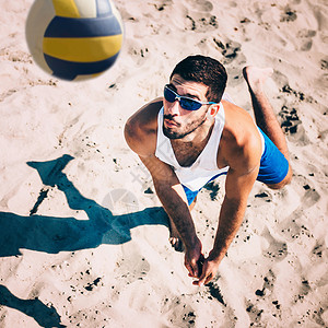 太阳镜沙滩球沙滩排球运动员背景