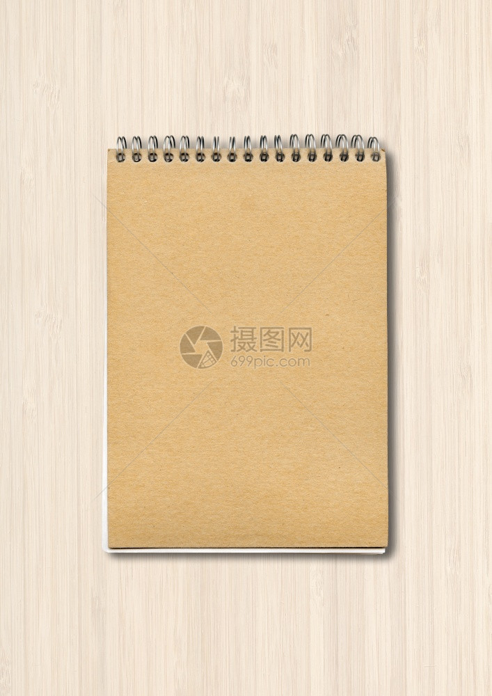 关闭的笔记本模型棕色纸封面孤立在白木背景上关闭的笔记本模型在白木背景上图片