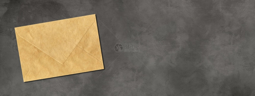 水平混凝土横幅上隔离的棕色纸包模拟版水平混凝土横幅上的棕色纸包模拟版图片