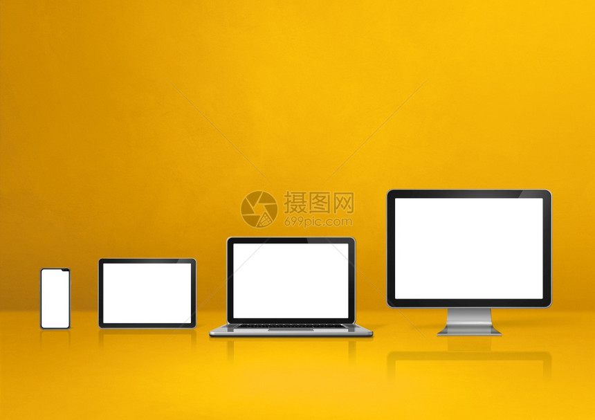 计算机膝上型移动电话和数字平板脑pc黄色办公桌背景图片