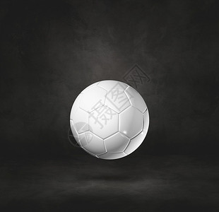 黑色工作室背景的白足球3D插图图片