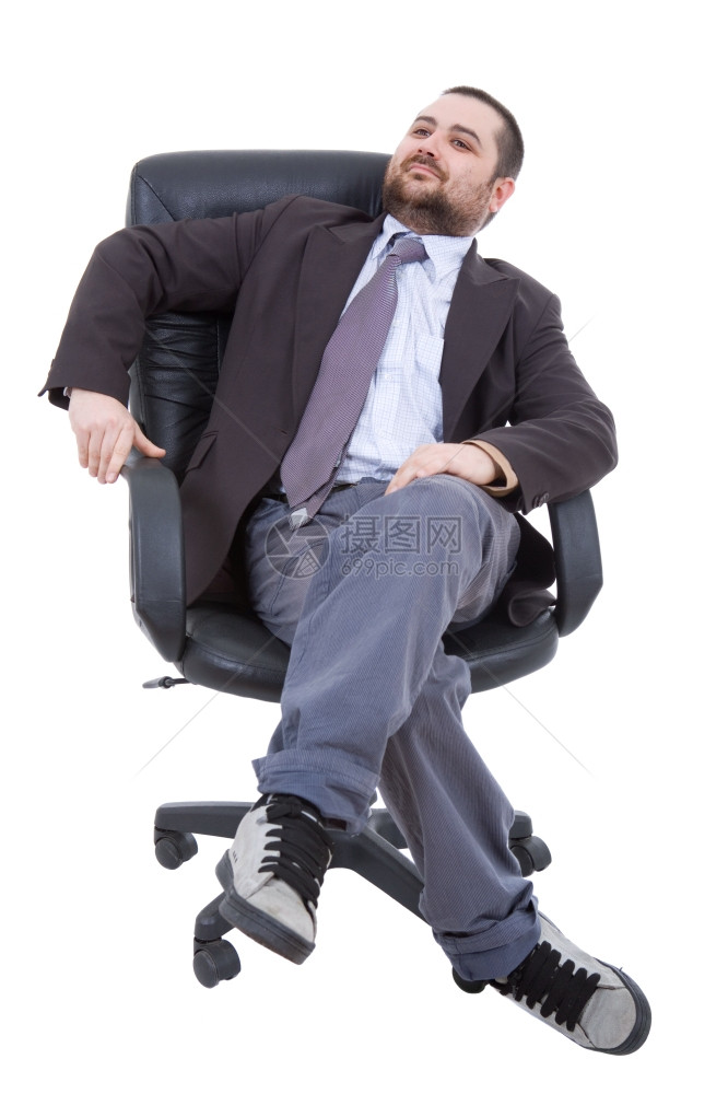年轻的商人坐在椅子上图片